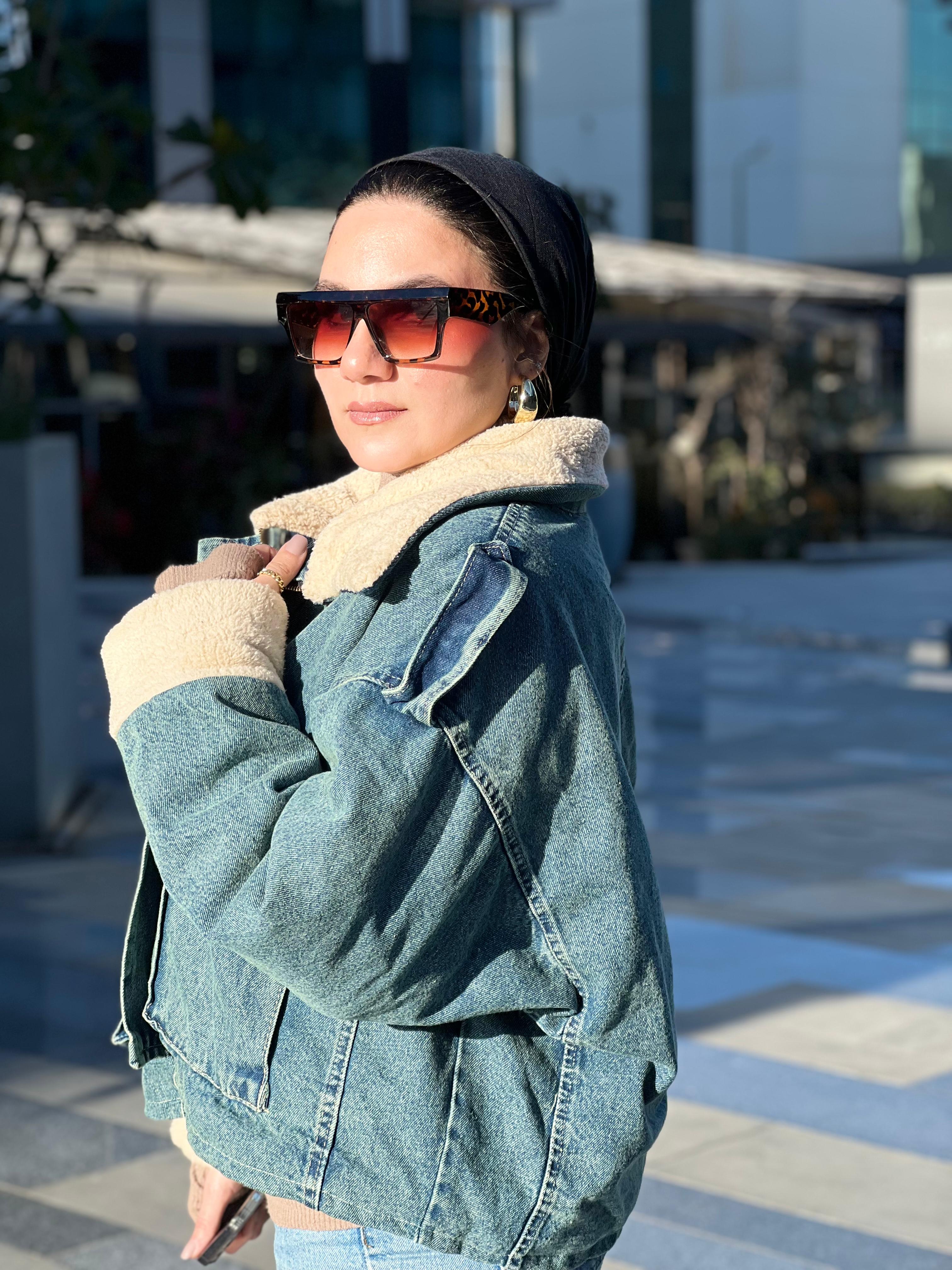 Denim jacket with tan fur