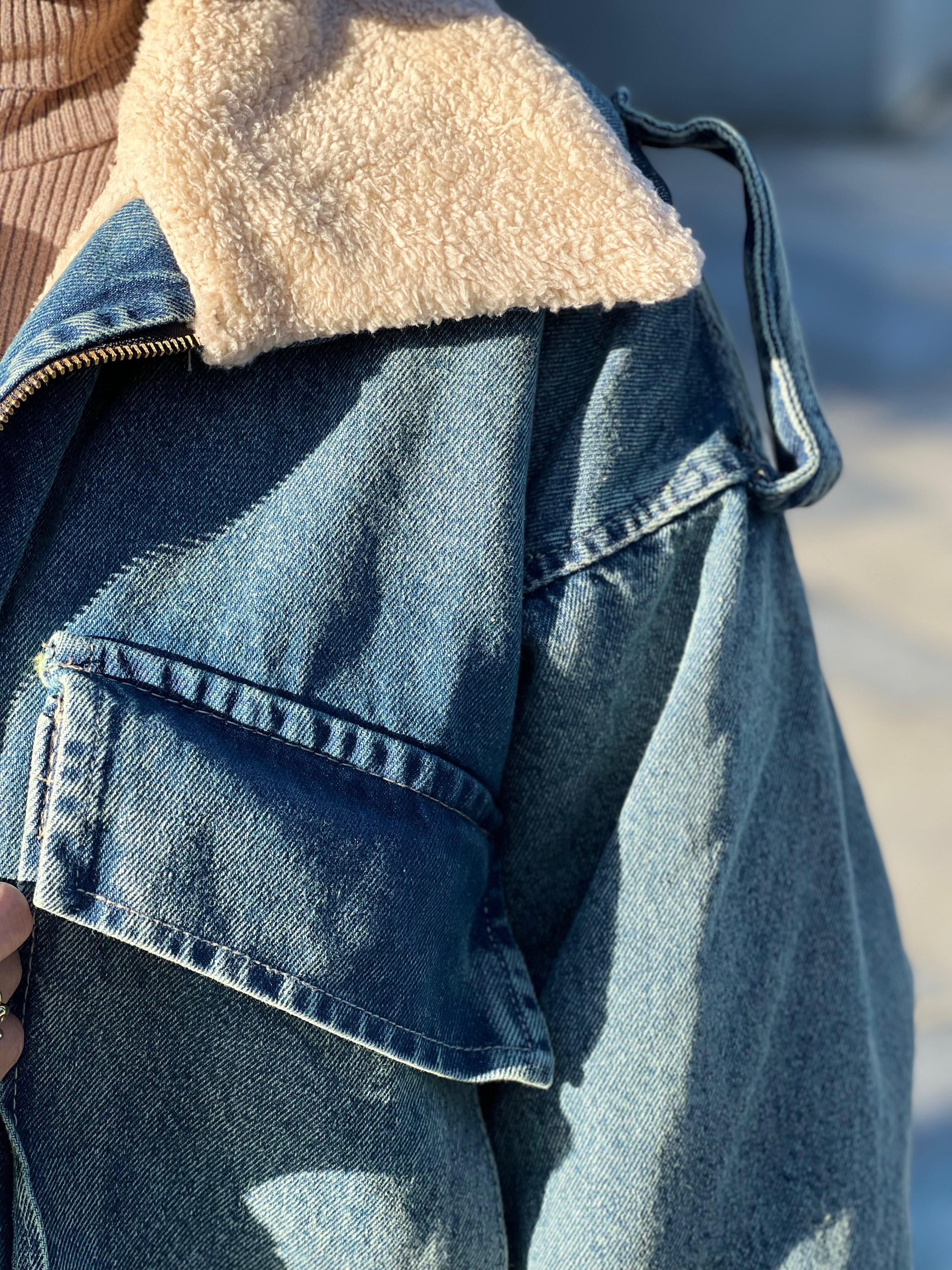 Denim jacket with tan fur