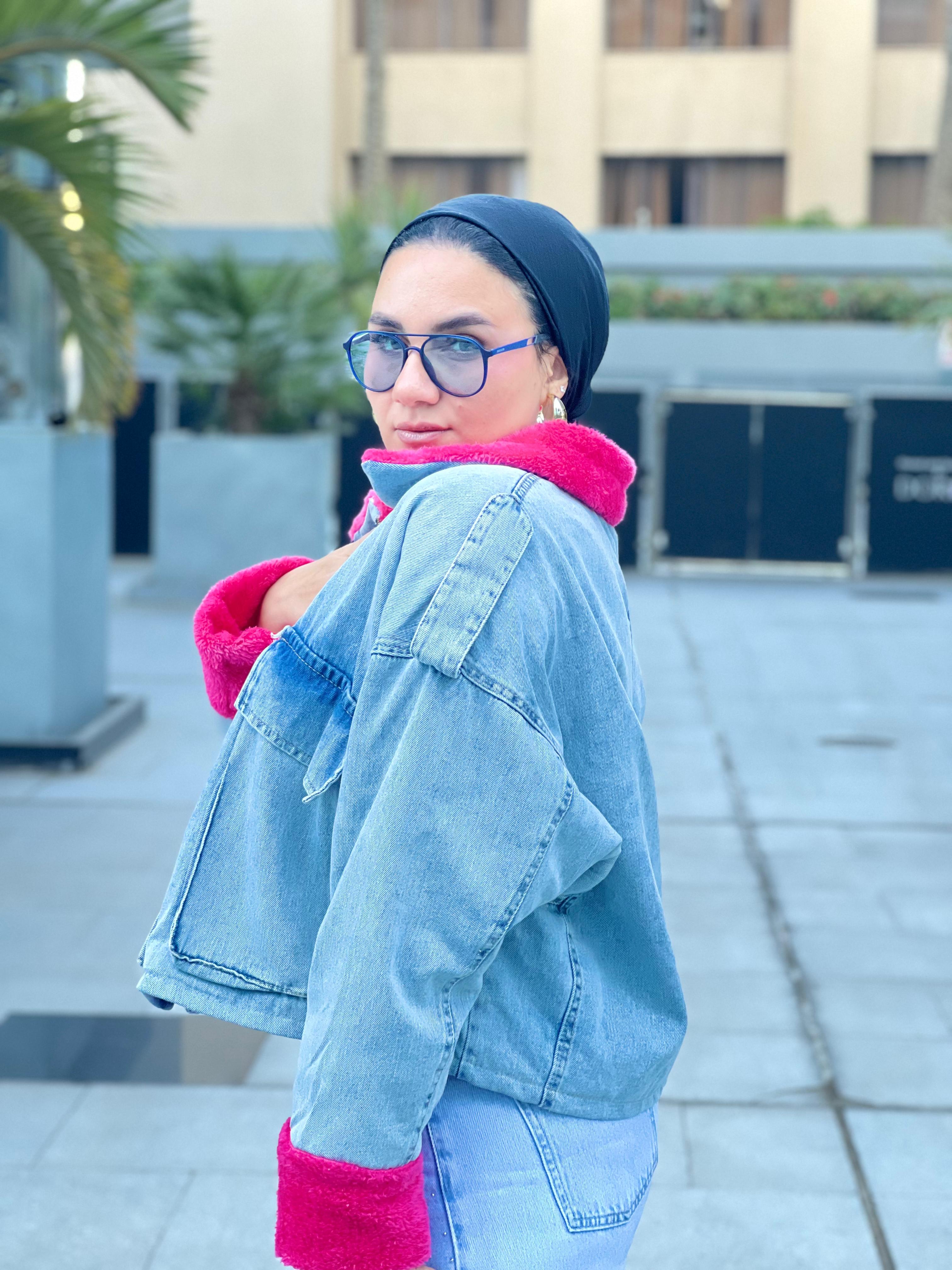 Denim jacket with hot pink fur