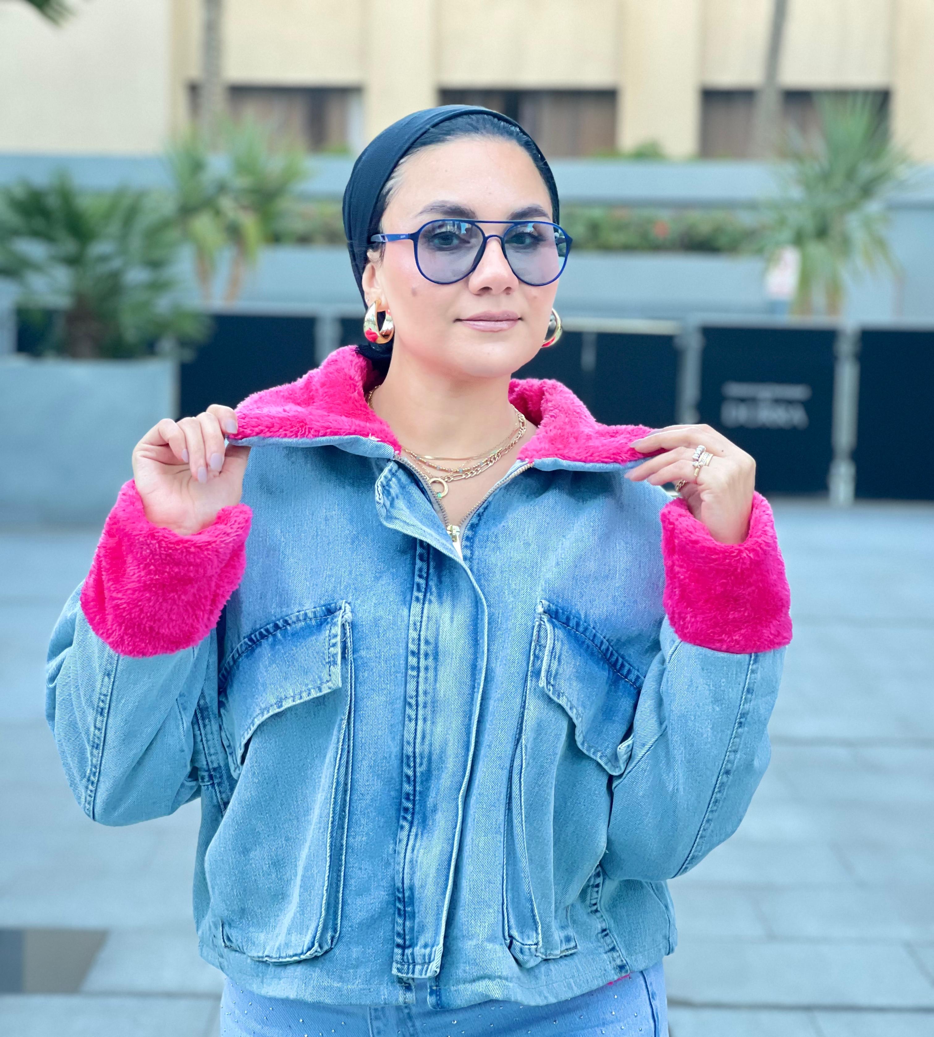 Denim jacket with hot pink fur